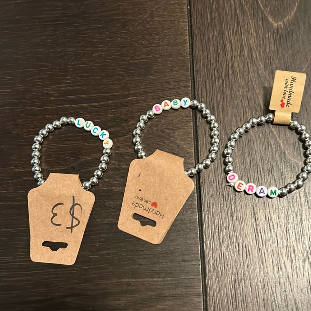 3 silver bracelets